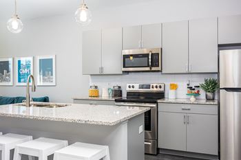 Gorgeous granite countertops with subway tile backsplash
